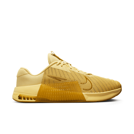 nike metcon gold and black